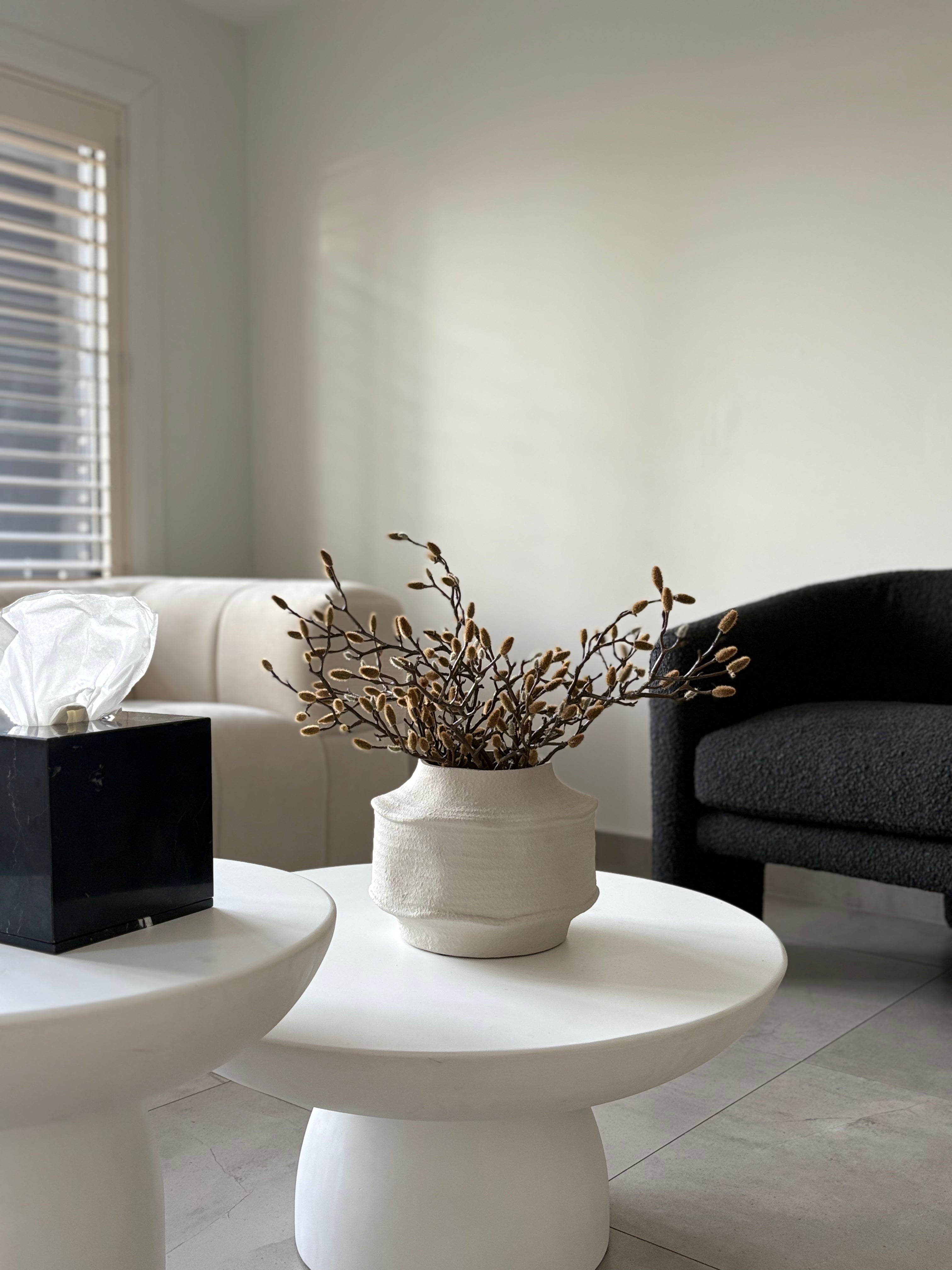 magnolia arrangement on coffee table