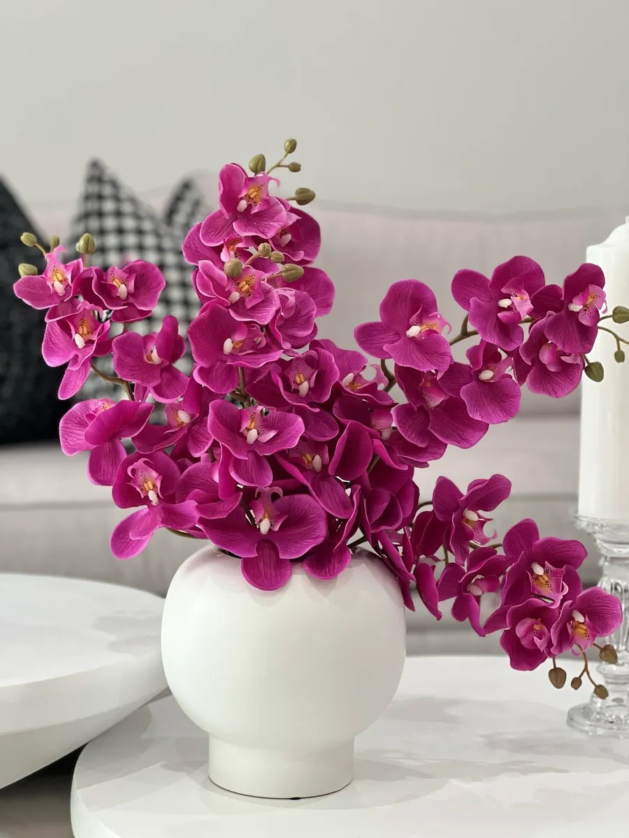 Xena artificial orchid arrangement with real touch magenta blooms in white vase – Fleurs D’Amour