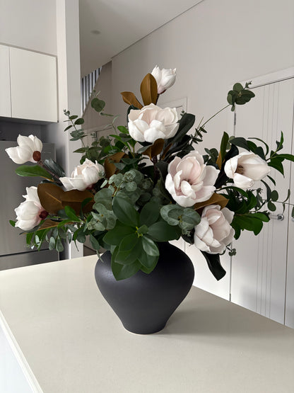 magnolia arrangement with black vase large