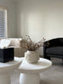 magnolia arrangement on coffee table