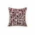 A square throw pillow featuring an abstract, distressed brushstroke pattern in deep burgundy and cream, with a thin cream piped edge, shown against a plain white background.